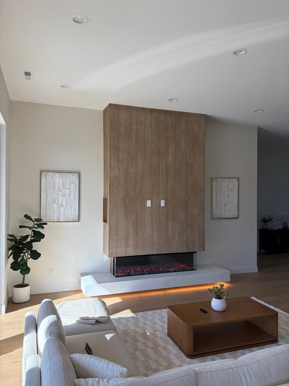Hand-troweled decorative plaster finish detail on residential fireplace, Barberton WA